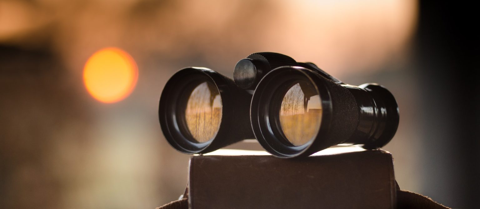 Binoculars represent finding subject experts for content marketing interviews