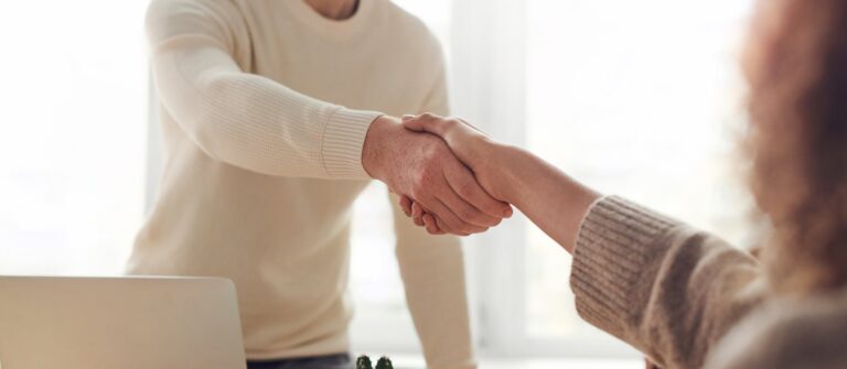 A handshake represents working with subject experts.