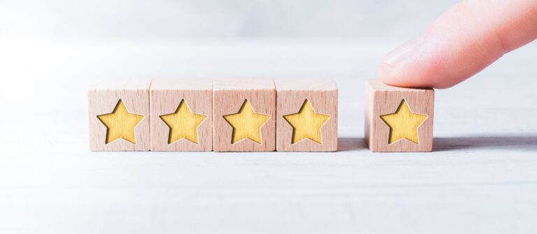 A row of stars represents the importance of customer feedback and managing your B2B brand's reputation.