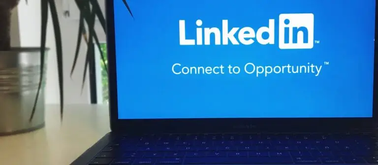 A screenshot of the LinkedIn logo on a laptop represents the importance of having an active B2B LinkedIn page.