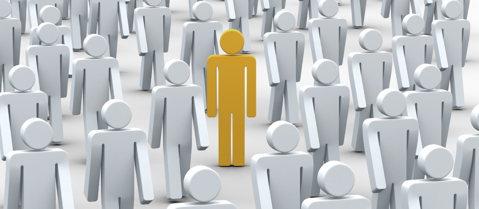 A graphic of one yellow figure among many gray figures represents the importance of human expertise in AI content.
