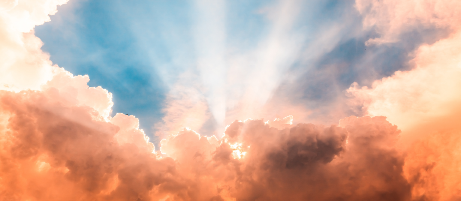 Soft light breaks through clouds, symbolizing how B2B trust forms early through clarity, safety and expert-led thought leadership