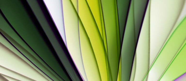 Abstract green, white and purple folded pages representing content audits and the layers of website content teams need to review.