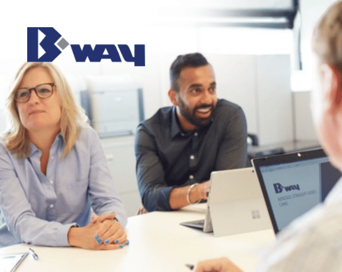 BWAY team members in office envirnoment with BWAY logo in top left corner