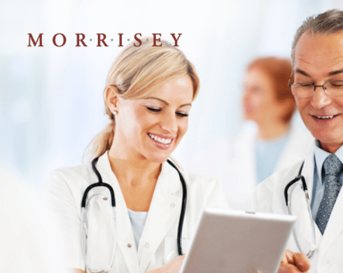Female and male healthcare professionals with Morrisey logo